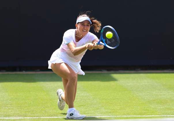22nd June 2025; Devonshire Park, Eastbourne, East Sussex, England: Lexus International Eastbourne, Qualifying Day 2; Kamilla Rakhimova plays a backhand against Heather Watson (GBR)  ActionPlus12804139 HongboxChen