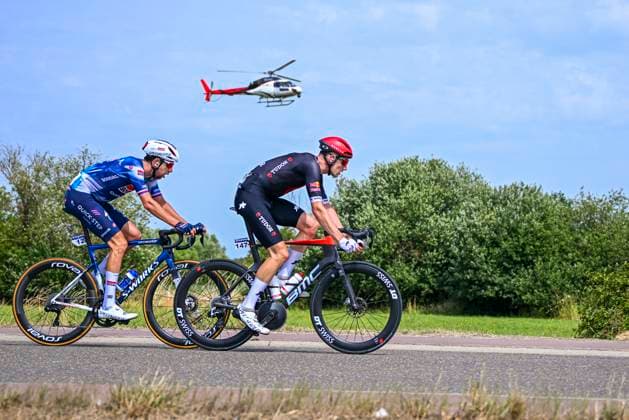 Baloise Belgium Tour 2025 Stage 5 BRUSSEL, BELGIUM - JUNE 22 : Cerny Josef (CZE) of Soudal Quick-Step, Suter Joel (SUI) of Tudor Pro Cycling Team in action during stage 5 of the 94th edition of Baloise Tour of Belgium an UCI ProSeries 2.Pro cycling road race stage for Men Elite of 183.2 km with start in Brussel and finish in Brussel on June 22, 2025 in Brussel, Belgium, 22 06 2025 ( Motordriver Guy De Vuyst - Brussel Belgium  Copyright: xTomasxSiskx