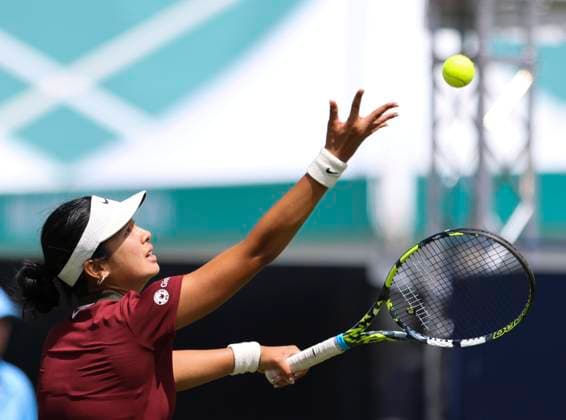 22nd June 2025; Devonshire Park, Eastbourne, East Sussex, England: Lexus International Eastbourne, Qualifying Day 2; Alexandra Eala (PHI) serves to Hailey Baptiste (USA)  ActionPlus12804207 HongboxChen