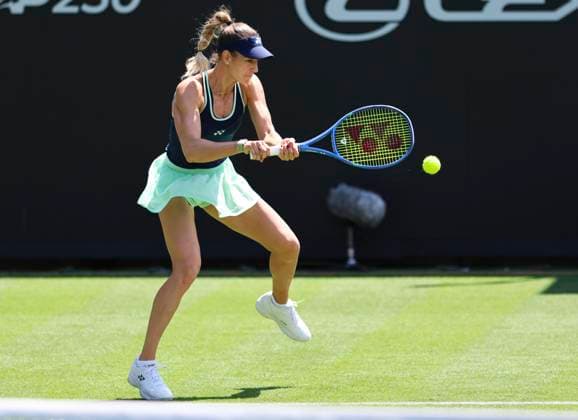22nd June 2025; Devonshire Park, Eastbourne, East Sussex, England: Lexus International Eastbourne, Qualifying Day 2; Anna Bondar (HUN) plays a backhand shot against Kimberly Birrell (AUS)  ActionPlus12804223 HongboxChen