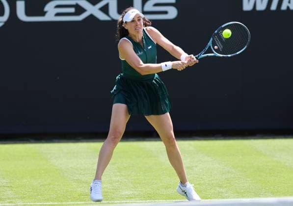 22nd June 2025; Devonshire Park, Eastbourne, East Sussex, England: Lexus International Eastbourne, Qualifying Day 2; Kimberly Birrell (AUS) plays a backhand shot against Anna Bondar (HUN)  ActionPlus12804230 HongboxChen