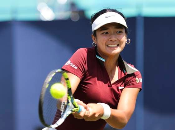 22nd June 2025; Devonshire Park, Eastbourne, East Sussex, England: Lexus International Eastbourne, Qualifying Day 2; Alexandra Eala (PHI) plays a backhand shot against Hailey Baptiste (USA)  ActionPlus12804212 HongboxChen
