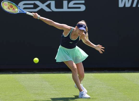22nd June 2025; Devonshire Park, Eastbourne, East Sussex, England: Lexus International Eastbourne, Qualifying Day 2; Anna Bondar (HUN) plays a backhand slice shot against Kimberly Birrell (AUS)  ActionPlus12804218 HongboxChen