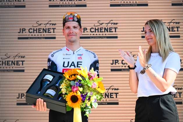 Tour de Suisse 2025 Stage 8 EMMETTEN STOCKHUTTE, SWITZERLAND - JUNE 22 : Almeida Joao (POR) of UAE Team Emirates - XRG on the podium during stage 8 of the 88th edition of Tour de Suisse an UCI World Tour 2.UWT Individual Time Trial stage for Men Elite of 10.1 km with start in Beckenried and finish in Emmetten Stockhutte on June 22, 2025 in Emmetten Stockhutte, Switzerland, 22 06 2025 ( Motordriver Kenny Verfaillie - Emmetten Stockhutte Switzerland  Copyright: xVincentxKalutx