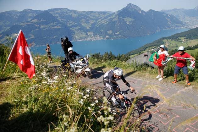 TDS 8 Stage Joao Almeida POR Team UAE Emirates 22 06 2025 Emmetten, SWITZERLAND, Men Tour de Suisse 8 Stage Beckenried Stockhuette Joao Almeida POR Team UAE Emirates on the climb to Stockhuette Lake Lucerne in the background