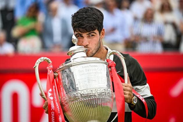 22nd June 2025; HSBC Championships, Queens Club, West Kensington, London, England: HSBC Mens Championships Queens Club, Day 7; Carlos Alcaraz (ESP) celebrates winning the final against Jiri Lehecka (CZE) by kissing the The Queen s Cup Gentlemen s Open Singles trophy  ActionPlus12804260 GodfreyxPitt