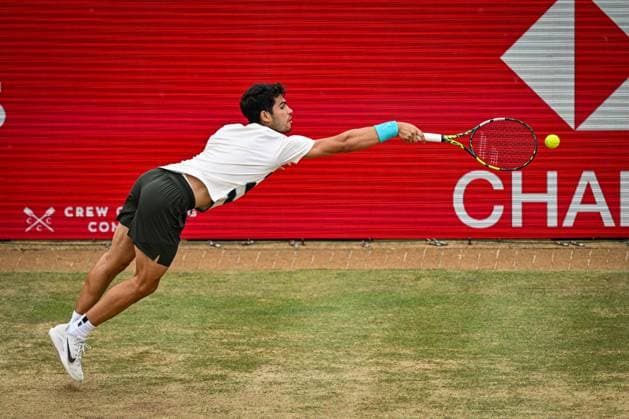 22nd June 2025; HSBC Championships, Queens Club, West Kensington, London, England: HSBC Mens Championships Queens Club, Day 7; Carlos Alcaraz (ESP) stretches for a backhand in the final against Jiri Lehecka (CZE)  ActionPlus12804246 GodfreyxPitt