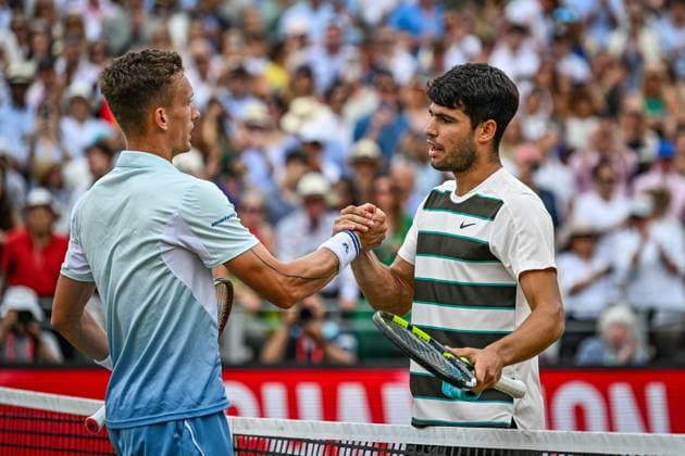 22nd June 2025; HSBC Championships, Queens Club, West Kensington, London, England: HSBC Mens Championships Queens Club, Day 7; Jiri Lehecka (CZE) congratulates Carlos Alcaraz (ESP) on his win in the final  ActionPlus12804254 GodfreyxPitt