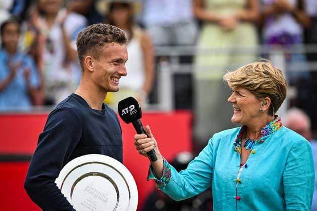22nd June 2025; HSBC Championships, Queens Club, West Kensington, London, England: HSBC Mens Championships Queens Club, Day 7; Jiri Lehecka (CZE) holds the runner-up plate and is interviewed by Clare Balding for the BBC after losing in the final to Carlos Alcaraz (ESP)  ActionPlus12804280 GodfreyxPitt