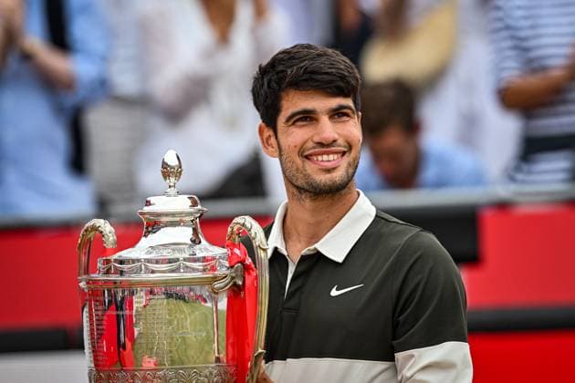 22nd June 2025; HSBC Championships, Queens Club, West Kensington, London, England: HSBC Mens Championships Queens Club, Day 7; Carlos Alcaraz (ESP) celebrates with the trophy after winning the final against Jiri Lehecka (CZE)  ActionPlus12804283 GodfreyxPitt