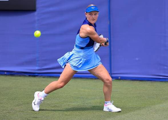 22nd June 2025; Devonshire Park, Eastbourne, East Sussex, England: Lexus International Eastbourne, Qualifying Day 2; Suzan Lamens (NEO) plays a backhand shot against Elisabetta Cocciaretto (ITA)  ActionPlus12804289 HongboxChen