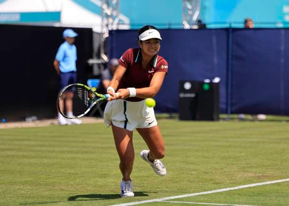 22nd June 2025; Devonshire Park, Eastbourne, East Sussex, England: Lexus International Eastbourne, Qualifying Day 2; Alexandra Eala (PHI) plays a backhand shot against Hailey Baptiste (USA)  ActionPlus12804313 HongboxChen