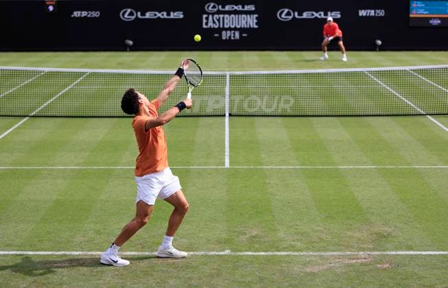 22nd June 2025; Devonshire Park, Eastbourne, East Sussex, England: Lexus International Eastbourne, Qualifying Day 2; George Loffhagen (GBR) serves to Billy Harris (GBR)  ActionPlus12804317 HongboxChen