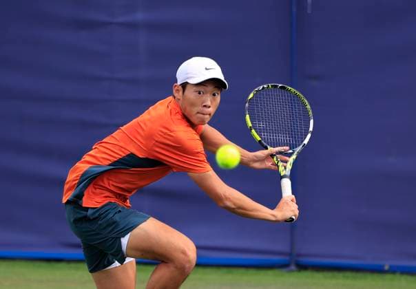22nd June 2025; Devonshire Park, Eastbourne, East Sussex, England: Lexus International Eastbourne, Qualifying Day 2; Chun-Hsin Tseng (TPE) plays a backhand shot against Mattia Bellucci (ITA)  ActionPlus12804340 HongboxChen