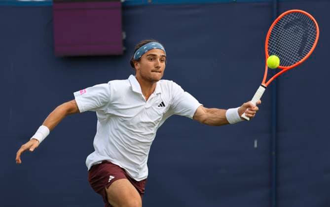 22nd June 2025; Devonshire Park, Eastbourne, East Sussex, England: Lexus International Eastbourne, Qualifying Day 2; Mattia Bellucci (ITA) plays a forehand shot against Chun-Hsin Tseng (TPE)  ActionPlus12804458 HongboxChen