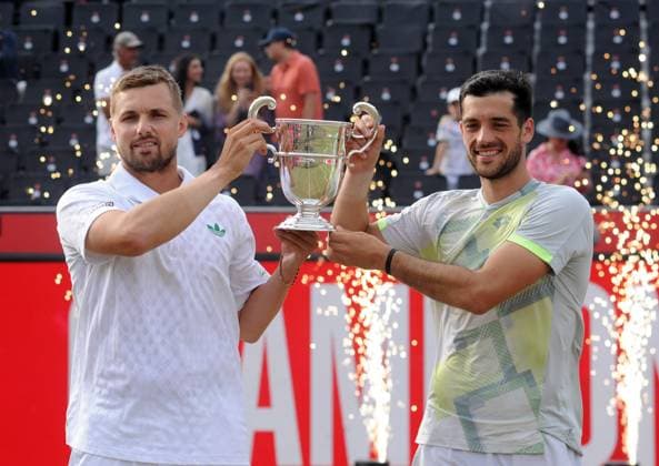 Tennis - 2025 ATP, Tennis Herren Men s HSBC Men™s Championships - Mens doubles Final - Nikola Mektic (Croatia) & Michael Venus (NZ) vs Julian Cash (Gbr) & Lloyd Glasspool (GBR) - Queen™s Club - Sunday 22nd June 2025 Julian Cash (Gbr) & Lloyd Glasspool (GBR) with the trophy 