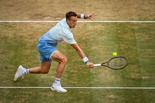 22nd June 2025; HSBC Championships, Queens Club, West Kensington, London, England: HSBC Mens Championships Queens Club, Day 7; Jiri Lehecka (CZE) hits a backhand volley in the final against Carlos Alcaraz (ESP)  ActionPlus12804533 GodfreyxPitt