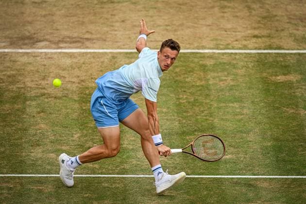 22nd June 2025; HSBC Championships, Queens Club, West Kensington, London, England: HSBC Mens Championships Queens Club, Day 7; Jiri Lehecka (CZE) hits a backhand volley in the final against Carlos Alcaraz (ESP)  ActionPlus12804534 GodfreyxPitt