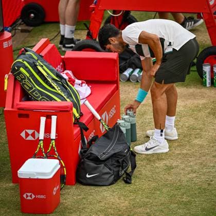 22nd June 2025; HSBC Championships, Queens Club, West Kensington, London, England: HSBC Mens Championships Queens Club, Day 7; Carlos Alcaraz (ESP) aligns his drinks bottles very carefully in the final against Jiri Lehecka (CZE)  ActionPlus12804538 GodfreyxPitt