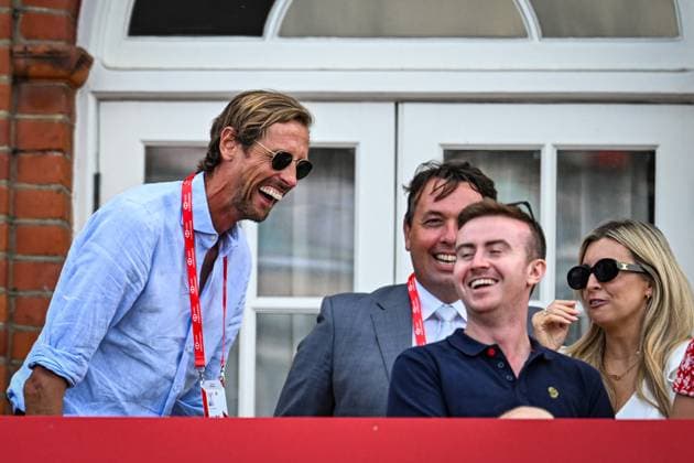 22nd June 2025; HSBC Championships, Queens Club, West Kensington, London, England: HSBC Mens Championships Queens Club, Day 7; Peter Crouch enjoys a joke with fellow spectators during the mens doubles final  ActionPlus12804560 GodfreyxPitt