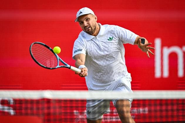 22nd June 2025; HSBC Championships, Queens Club, West Kensington, London, England: HSBC Mens Championships Queens Club, Day 7; Lloyd Glasspool (GBR) hits a forehand in the mens doubles final match with the partner Julian Cash (GBR) against Nikola Mektic (CRO) and Michael Venus (NZL)  ActionPlus12804563 GodfreyxPitt
