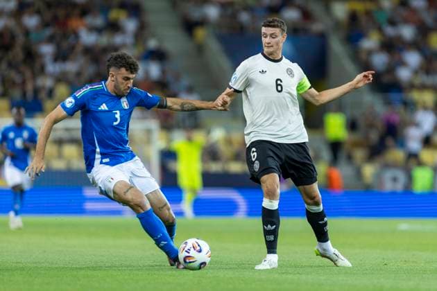 UEFA U21 European Championship, quarter-final Germany Italy 22 06 2025 Eric Martel Germany, 6 , Matteo Ruggeri Italy, 3 at the UEFA U21 European Championship quarter-final match Germany Italy, on 22 06 2025, DAC Arena, Dunajska Streda, Slovakia Copyright: xBEAUTIFULxSPORTS Meuselx