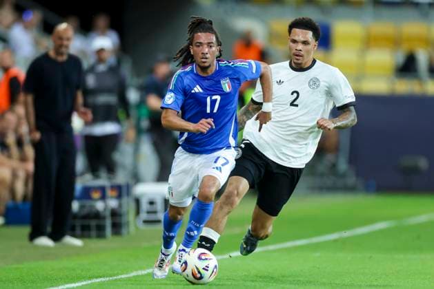 Luca Koleosho Italy and Nnamdi Collins Germany battle for the ball, UEFA European Under 21 Championship 2025 Quarter Final, Germany v Italy, MOL ArÃ na on June 22, 2025 in Dunajska Streda, Slovakia Photo by Marco Steinbrenner DeFodi Images Luca Koleosho Italy and Nnamdi Collins Germany battle for the ball, UEFA European Under 21 Championship 2025 Quarter Final, Germany v Italy, MOL ArÃ na, June 22, 2025 in Dunajska Streda, Slovakia Photo by Marco Steinbrenner DeFodi Images