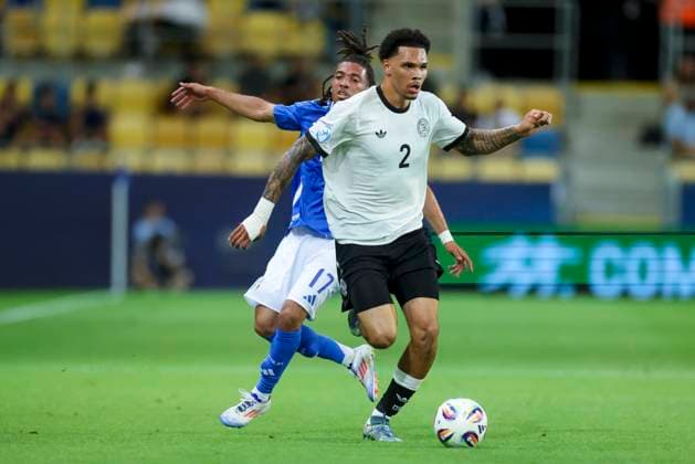 Luca Koleosho Italy and Nnamdi Collins Germany battle for the ball, UEFA European Under 21 Championship 2025 Quarter Final, Germany v Italy, MOL ArÃ na on June 22, 2025 in Dunajska Streda, Slovakia Photo by Marco Steinbrenner DeFodi Images Luca Koleosho Italy and Nnamdi Collins Germany battle for the ball, UEFA European Under 21 Championship 2025 Quarter Final, Germany v Italy, MOL ArÃ na, June 22, 2025 in Dunajska Streda, Slovakia Photo by Marco Steinbrenner DeFodi Images