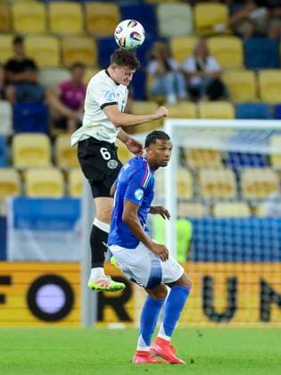 Eric Martel Germany and Cher Ndour Italy battle for the ball, UEFA European Under 21 Championship 2025 Quarter Final, Germany v Italy, MOL Arà na on June 22, 2025 in Dunajska Streda, Slovakia Photo by Marco Steinbrenner DeFodi Images Eric Martel Germany and Cher Ndour Italy battle for the ball, UEFA European Under 21 Championship 2025 Quarter Final, Germany v Italy, MOL Arà na, June 22, 2025 in Dunajska Streda, Slovakia Photo by Marco Steinbrenner DeFodi Images
