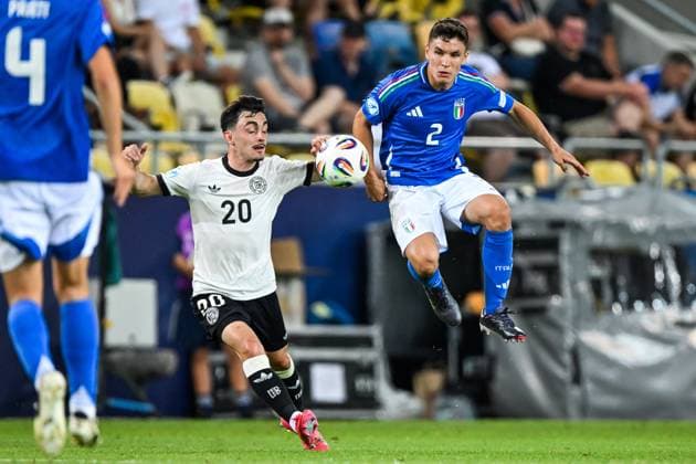 DUNAJSKA STREDA - (l-r) Paul Nebel of Germany U21, U 21 Mattia Zanotti of Italy U21 at the DAC Arena during the under-21 European Championship, EM, Europameisterschaft quarterfinal duel between Germany and Italy. ANP Hollandse Hoogte SOC 2025 xVIxANPxSportx xGerritxvanxKeulenxIVx 530322499 originalFilename: 530322499.jpg
