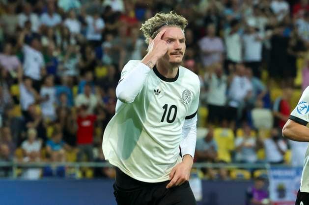 Nick Woltemade Germany celebrates scoring his teams first goal, UEFA European Under 21 Championship 2025 Quarter Final, Germany v Italy, MOL Arà na on June 22, 2025 in Dunajska Streda, Slovakia Photo by Marco Steinbrenner DeFodi Images Nick Woltemade Germany celebrates after scoring his teams first goal, UEFA European Under 21 Championship 2025 Quarter Final, Germany v Italy, MOL Arà na, June 22, 2025 in Dunajska Streda, Slovakia Photo by Marco Steinbrenner DeFodi Images