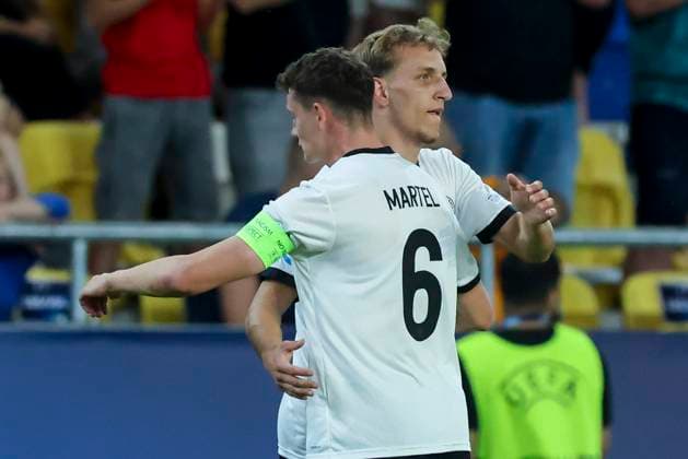 Nelson Weiper Germany celebrates after scoring his teams second goal with Eric Martel Germany , UEFA European Under 21 Championship 2025 Quarter Final, Germany v Italy, MOL Arà na on 22 June 2025 in Dunajska Streda, Slovakia Photo by Marco Steinbrenner DeFodi Images Nelson Weiper Germany celebrates after scoring his teams second goal with Eric Martel Germany , UEFA European Under 21 Championship 2025 Quarter Final, Germany v Italy, MOL Arà na, June 22, 2025 in Dunajska Streda, Slovakia Photo by Marco Steinbrenner DeFodi Images