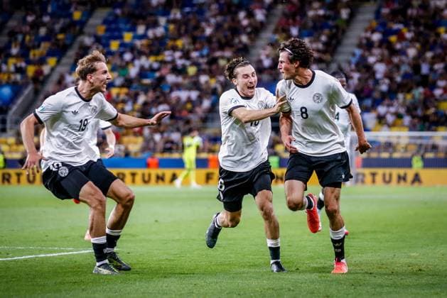 GERMANY U21, U 21 - ITALY U21 Merlin Rohl of Germany celebrates a goal with Nathaniel Brown and Nelson Weiper during the UEFA European Under-21 Championship 2025 Quarterfinal football match between Germany U21 and Italy U21. Stadium DAC Arena (MOL Arena), Dunajska Streda, Slovakia, June 22, 2025. Photo by Branislav Racko Copyright: xx _BRR3362