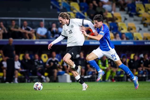 GERMANY U21, U 21 - ITALY U21 Nick Woltemade of Germany and Giovanni Fabbian of Italy during the UEFA European Under-21 Championship 2025 Quarterfinal football match between Germany U21 and Italy U21. Stadium DAC Arena (MOL Arena), Dunajska Streda, Slovakia, June 22, 2025. Photo by Branislav Racko Copyright: xx 080A3547