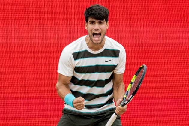 (250623) -- LONDON, June 23, 2025 -- Carlos Alcaraz celebrates after winning the men s singles final between Carlos Alcaraz of Spain and Jiri Lehecka of the Czech Republic at the Queen s Club Championships in London, Britain, on June 22, 2025. (Photo by Xinhua) (SP)BRITAIN-LONDON-TENNIS-QUEEN S CLUB CHAMPIONSHIPS-MEN S SINGLES-FINAL StephenxChung 