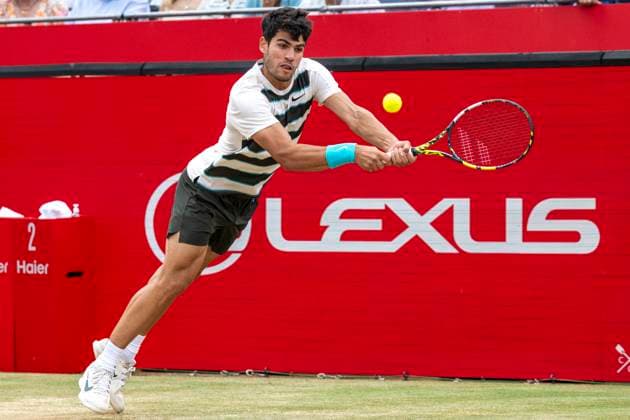 (250623) -- LONDON, June 23, 2025 -- Carlos Alcaraz returns a shot during the men s singles final between Carlos Alcaraz of Spain and Jiri Lehecka of the Czech Republic at the Queen s Club Championships in London, Britain, on June 22, 2025. (Photo by Xinhua) (SP)BRITAIN-LONDON-TENNIS-QUEEN S CLUB CHAMPIONSHIPS-MEN S SINGLES-FINAL StephenxChung 