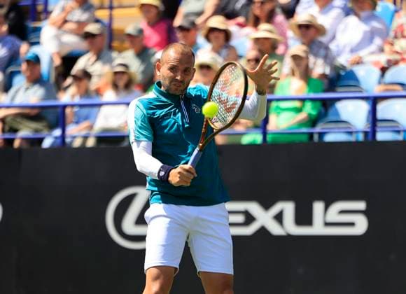 23rd June 2025; Devonshire Park, Eastbourne, East Sussex, England; Lexus International Eastbourne, Day 1; Daniel Evans (GBR) plays a backhand shot against Miomir Kecmanovic (SRB)  ActionPlus12804768 HongboxChen