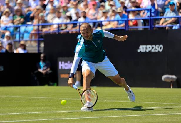 23rd June 2025; Devonshire Park, Eastbourne, East Sussex, England; Lexus International Eastbourne, Day 1; Daniel Evans (GBR) plays a backhand shot against Miomir Kecmanovic (SRB)  ActionPlus12804772 HongboxChen