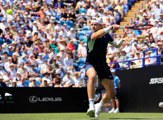 23rd June 2025; Devonshire Park, Eastbourne, East Sussex, England; Lexus International Eastbourne, Day 1; Zizou Bergs (BEL) plays a backhand shot against Joao Fonseca (BRA)  ActionPlus12804746 HongboxChen