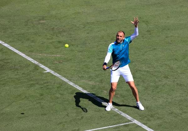 23rd June 2025; Devonshire Park, Eastbourne, East Sussex, England; Lexus International Eastbourne, Day 1; Daniel Evans (GBR) plays a backhand shot against Miomir Kecmanovic (SRB)  ActionPlus12804780 HongboxChen