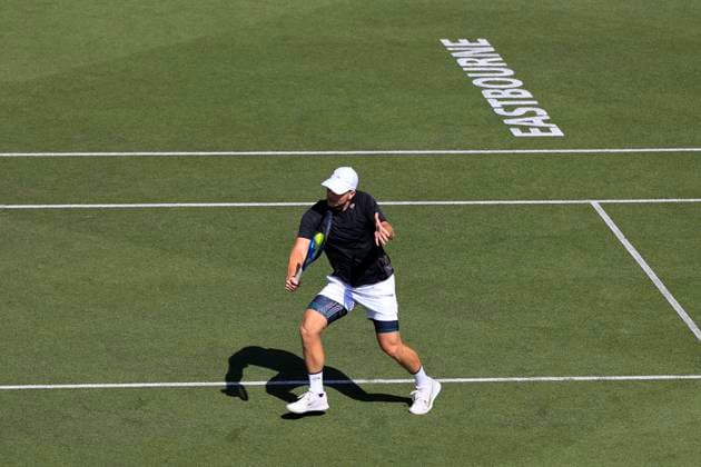 23rd June 2025; Devonshire Park, Eastbourne, East Sussex, England; Lexus International Eastbourne, Day 1; Miomir Kecmanovic (SRB) plays a backhand shot against Daniel Evans (GBR)  ActionPlus12804787 HongboxChen