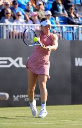 23rd June 2025; Devonshire Park, Eastbourne, East Sussex, England; Lexus International Eastbourne, Day 1; Lulu Sun (NZL) plays a backhand shot against Daria Kasatkina (AUS)  ActionPlus12804813 HongboxChen