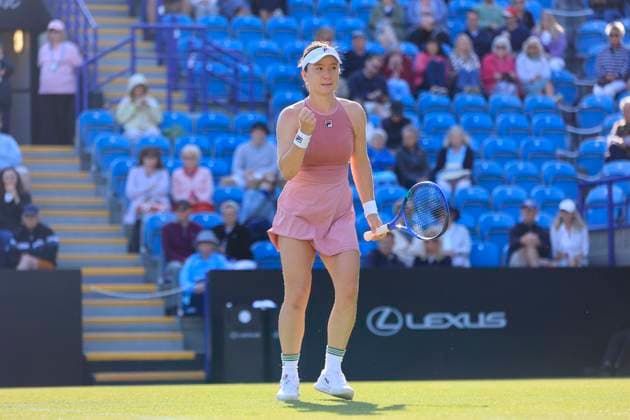 23rd June 2025; Devonshire Park, Eastbourne, East Sussex, England; Lexus International Eastbourne, Day 1; Lulu Sun (NZL) reacts after winning a game against Daria Kasatkina (AUS)  ActionPlus12804819 HongboxChen