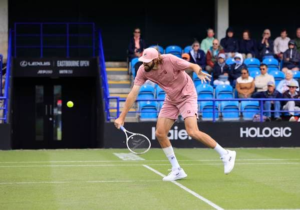 24th June 2025; Devonshire Park, Eastbourne, East Sussex, England; Lexus International Eastbourne, Day 2; Reilly Opelka (USA) plays a backhand shot against George Loffhagen (GBR)  ActionPlus12805047 HongboxChen