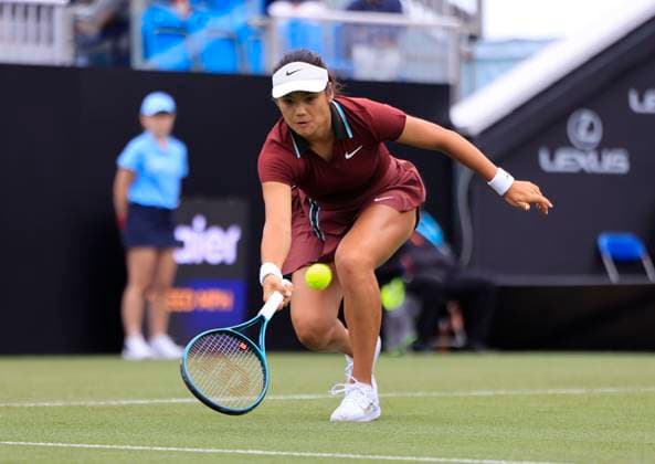 24th June 2025; Devonshire Park, Eastbourne, East Sussex, England; Lexus International Eastbourne, Day 2; Emma Raducanu (GBR) plays a forehand shot against Ann Li (USA)  ActionPlus12805114 HongboxChen