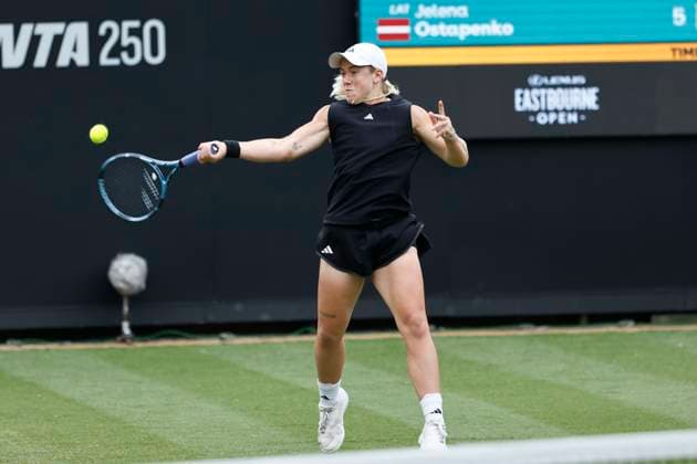 24th June 2025; Devonshire Park, Eastbourne, East Sussex, England; Lexus International Eastbourne, Day 2; Sonay Kartal (GBR) plays a forehand against Jelena Ostapenko (LAT)  ActionPlus12805130 HongboxChen