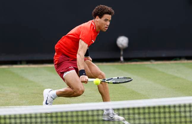 24th June 2025; Devonshire Park, Eastbourne, East Sussex, England; Lexus International Eastbourne, Day 2; George Loffhagen (GBR) plays a backhand shot against Reilly Opelka (USA)  ActionPlus12805148 HongboxChen