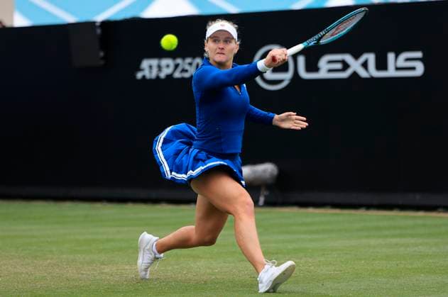 24th June 2025; Devonshire Park, Eastbourne, East Sussex, England; Lexus International Eastbourne, Day 2; Peyton Stearns (USA) plays a backhand shot against Mingge Xu (GBR)  ActionPlus12805236 HongboxChen