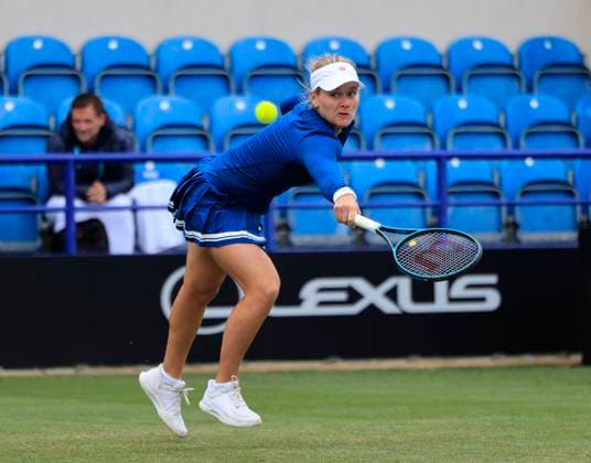 24th June 2025; Devonshire Park, Eastbourne, East Sussex, England; Lexus International Eastbourne, Day 2; Peyton Stearns (USA) plays a backhand shot against Mingge Xu (GBR)  ActionPlus12805240 HongboxChen
