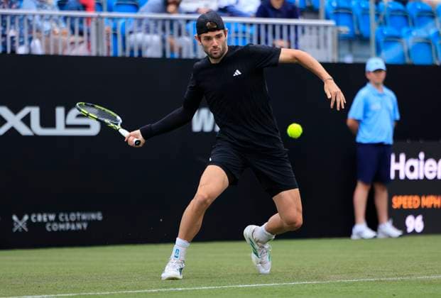 24th June 2025; Devonshire Park, Eastbourne, East Sussex, England; Lexus International Eastbourne, Day 2; Jacob Fearnley (GBR) plays a forehand shot against Flavio Cobolli (ITA)  ActionPlus12805253 HongboxChen
